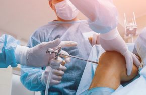 Why does a patient visit an orthopedic surgeon
